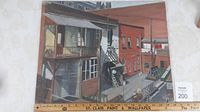 Full view of the oil on board painting showing an urban courtyard with buildings, balconies, and fire escapes in muted earth tones.
