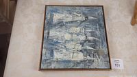 Front view of framed abstract oil painting showing full image and frame.