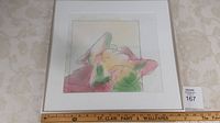 Framed artwork of a reclining nude figure with pastel watercolour washes, titled Danae.