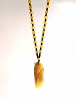 Full view of yellow and black jade bead necklace with hanging cicada pendant