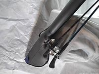 Fishing poles secured inside the hard carrying case to demonstrate fit and protection during transport.