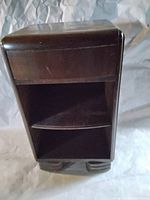 Full front view of the night stand showing the open shelf and lower removable shelf.