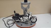 Full view of Harley Davidson motorcycle lamp with black power cord