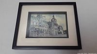 Framed and matted print showing the Prince George Hotel and City Hall in Kingston, viewed head-on.