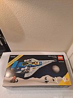 Front view of the sealed Lego Galaxy Explorer box showing set number 10497 and 1254 pieces count.