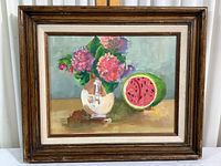 Full view of the framed still life painting showing the vase of flowers and watermelon, including the frame condition.