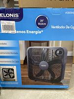 Photo shows the original packaging of a Pelonis 20 inch box fan, with a picture of the product on the box and product details visible.
