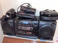 Panasonic stereo sound system with two detachable speakers, cassette and CD player.