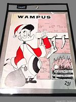 Front cover of Wampus magazine featuring a cartoon penguin dressed as Santa Claus.