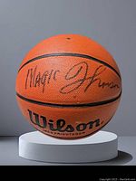 Wilson Pro Star basketball with visible Magic Johnson signature on one panel.