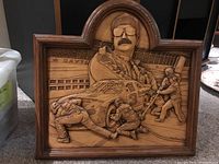 Full view of resin wood plaque showing detailed NASCAR pit stop scene including race car and crew with background elements.