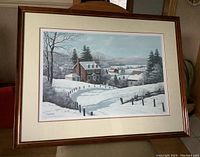 Full view of the framed and matted 'Playtime' print showing a snow-covered rural landscape with houses and trees.