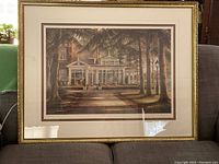 Full view of the framed print showing the conservatory surrounded by trees with a gold gilt wooden frame.