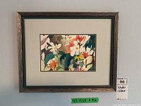 Full view of the framed watercolour painting featuring an abstract flower composition.