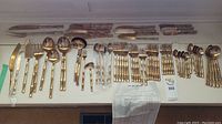 Full layout of flatware pieces on table