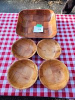 One photo shows a large square wooden platter and four round wooden bowls on a red and white checkered cloth surface.