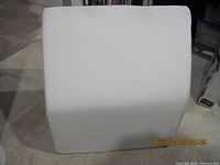 Front view of the grey leg elevation pillow showing the full size and texture of the cover.