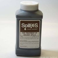 Front view of a 1 pound plastic container of Ansul Spill-X-S solvent adsorbent, showing label with product information and usage instructions.