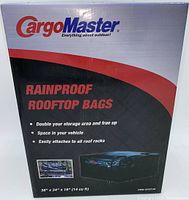 Front of the sealed box showing CargoMaster branding and product info including dimensions 38 x 34 x 18 inches and 14 cubic feet capacity.