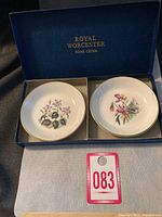 Set of two Royal Worcester bone china pin trays in original box labeled Royal Worcester Bone China.