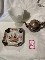 Lot with frosted glass vase, square floral decorative plate, and silver teapot visible