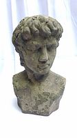 Front view of the garden bust showcasing facial features and textured surface.