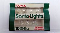Box of 10 NOMA Santa Lights clear incandescent bulbs for outdoor use