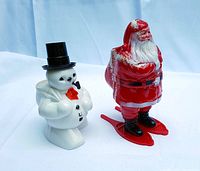 Snowman and Santa Claus holiday candy cane holders side view