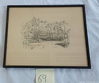 Framed pencil drawing depicting a landscape with trees and a boat near water, signed by artist.