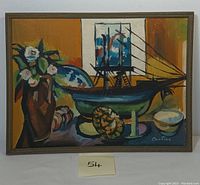 Full view of abstract oil painting depicting still life with a model sailboat, flowers in vase, shell, and ceramic bowl, with artist signature visible.