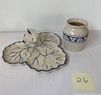 Photo showing the rabbit-shaped serving tray and vase side by side on a white surface with a lot number card.