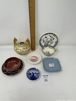 Photo showing all eight pieces together with a ruler for size reference. Includes a Minton vase, Royal Worcester cup and saucer, Wedgwood plates, Wedgwood ashtray, Royal Winton Grimwades bowl and underplate, and Denmark Langelinie dish.
