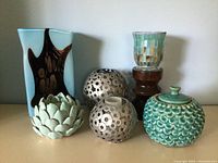 All six items displayed together on a flat surface, showing overall lot contents and arrangement.