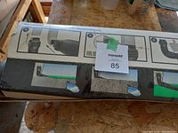 Box packaging featuring visual installation instructions for downspout drainage extension.