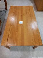 Top view of the pine wood Scanica table showing rectangular surface and wood grain