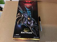 Front view of vintage 1997 Kenner Batman & Robin Collector Series box with Batman figure featured in stylized artwork, next to a Sharpie marker for size scale.