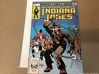 Front cover of The Further Adventures of Indiana Jones #1 comic book with Indiana Jones holding a whip in action pose