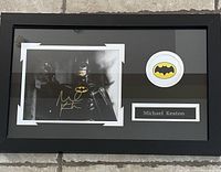 Custom framed Michael Keaton autographed photo displayed with Batman logo graphic and nameplate