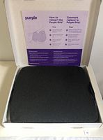 Purple Royal seat cushion inside opened box showing how to reinsert the Purple Grid insert.