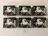 Front view of the 6 boxed soaps showing vintage Mickey Mouse design with 'Facial Soap' text.