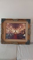 Full view of the framed painting showing the church interior and congregation.