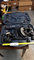 Mastercraft rotary tool and router attachment inside blue carrying case with power cords and clamps