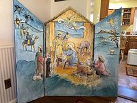 Full view of tri-fold nativity scene open, showing all painted panels and full scene.