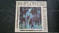 100 Flowers '21st Guessing' vinyl album cover showing an abstract art design with figures and floral themes.