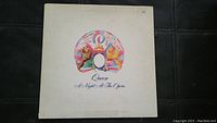 Front of the vinyl album cover showing colorful artwork and title.