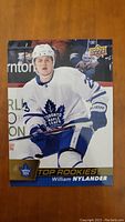 Front of William Nylander Top Rookies hockey card in Toronto Maple Leafs uniform.
