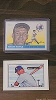 Front of two Mickey Mantle baseball cards, one with color photo and one illustrated.