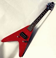 Full body view of red Epiphone Flying V Mini electric guitar showing front and upper body shape.