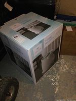 Box of the Haven towel warmer showing brand and product images.