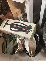 Intex Double Quick III air pump in original box resting on camping gear